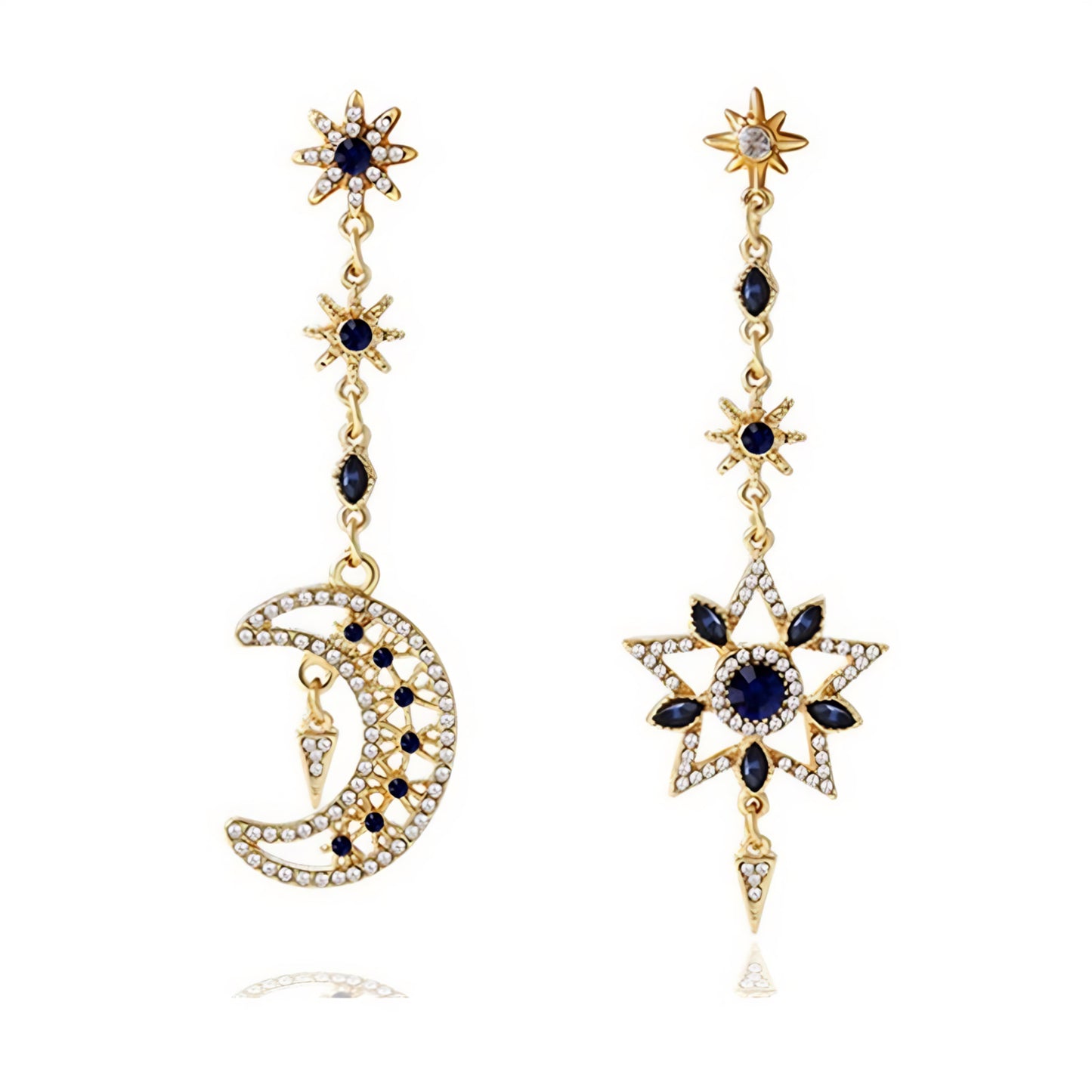 Gold-tone earrings featuring detailed moon, star, and sun designs adorned with white crystals and dark blue gemstones.