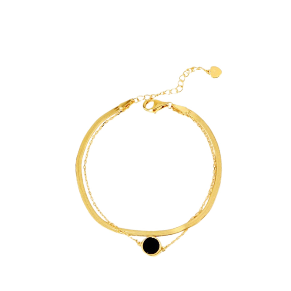 Gold-toned layered bracelet with a black circle pendant.