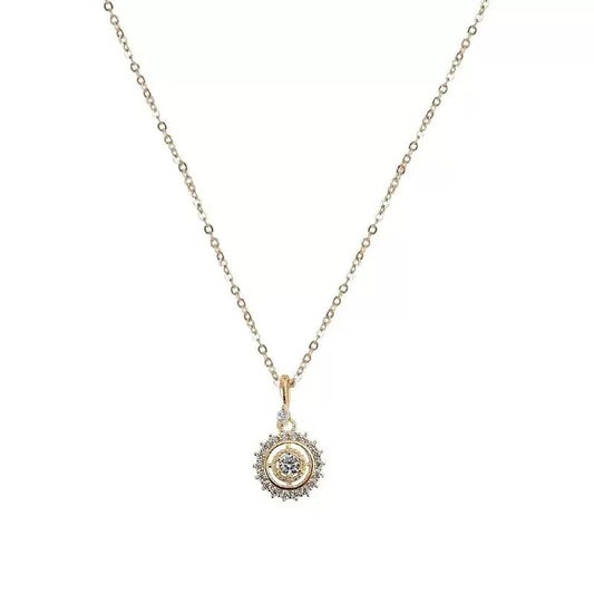 Delicate diamond-studded pendant necklace with a circular design.