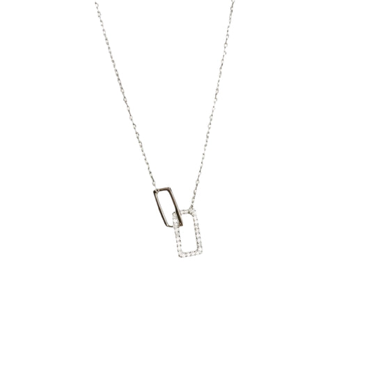Delicate silver necklace with interlocking, diamond-encrusted rectangular shapes.