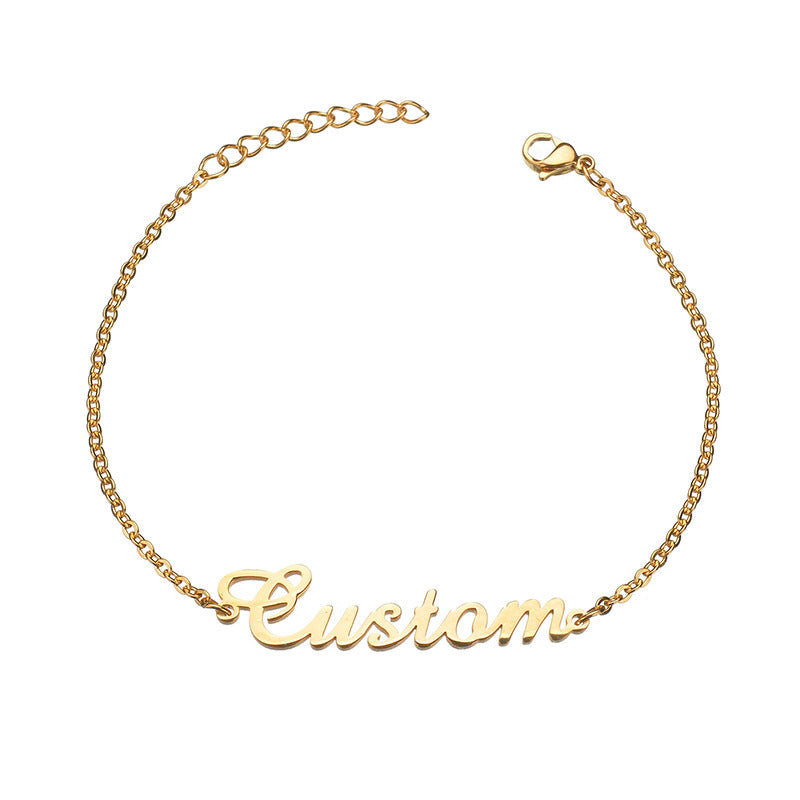 Engravable gold bracelet featuring a personalized name design, elegantly crafted for a stylish and unique accessory.