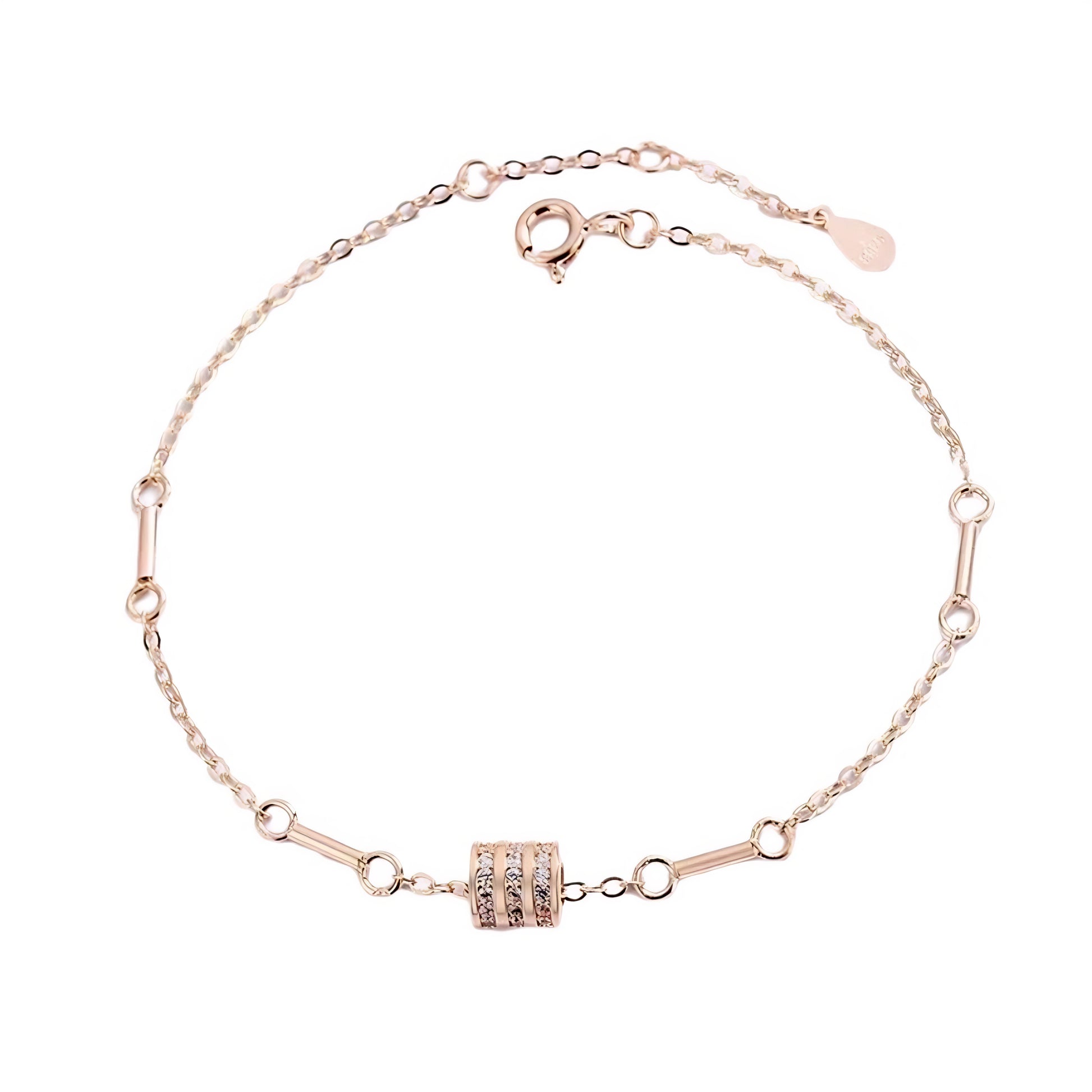 Rose gold bracelet with a diamond-studded cylinder charm and connecting bar links.
